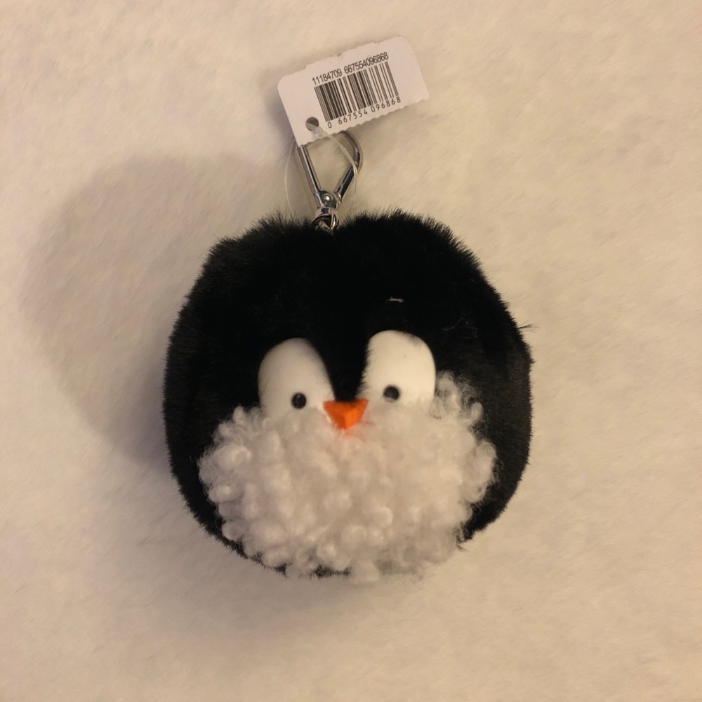 Penguin pom pocketbac holder